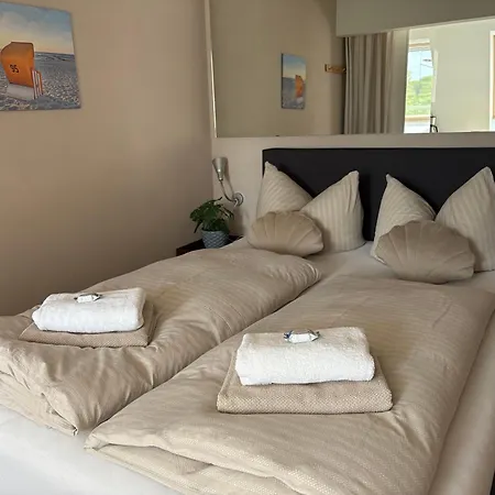 Апартаменты Strandliebe - Mit Meerblick Харрисле